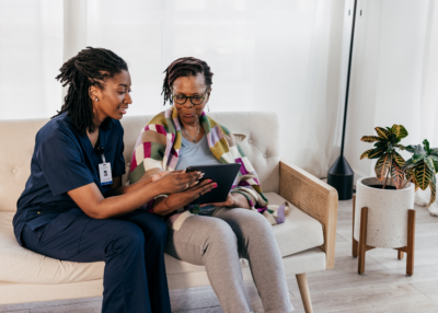 Barriers Image depicting a nurse and patient talking about barriers to hospice care