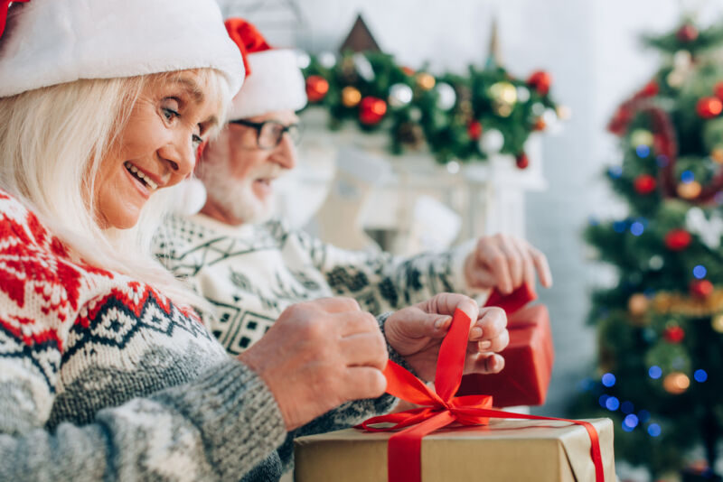 hospice patients opening Christmas gifts