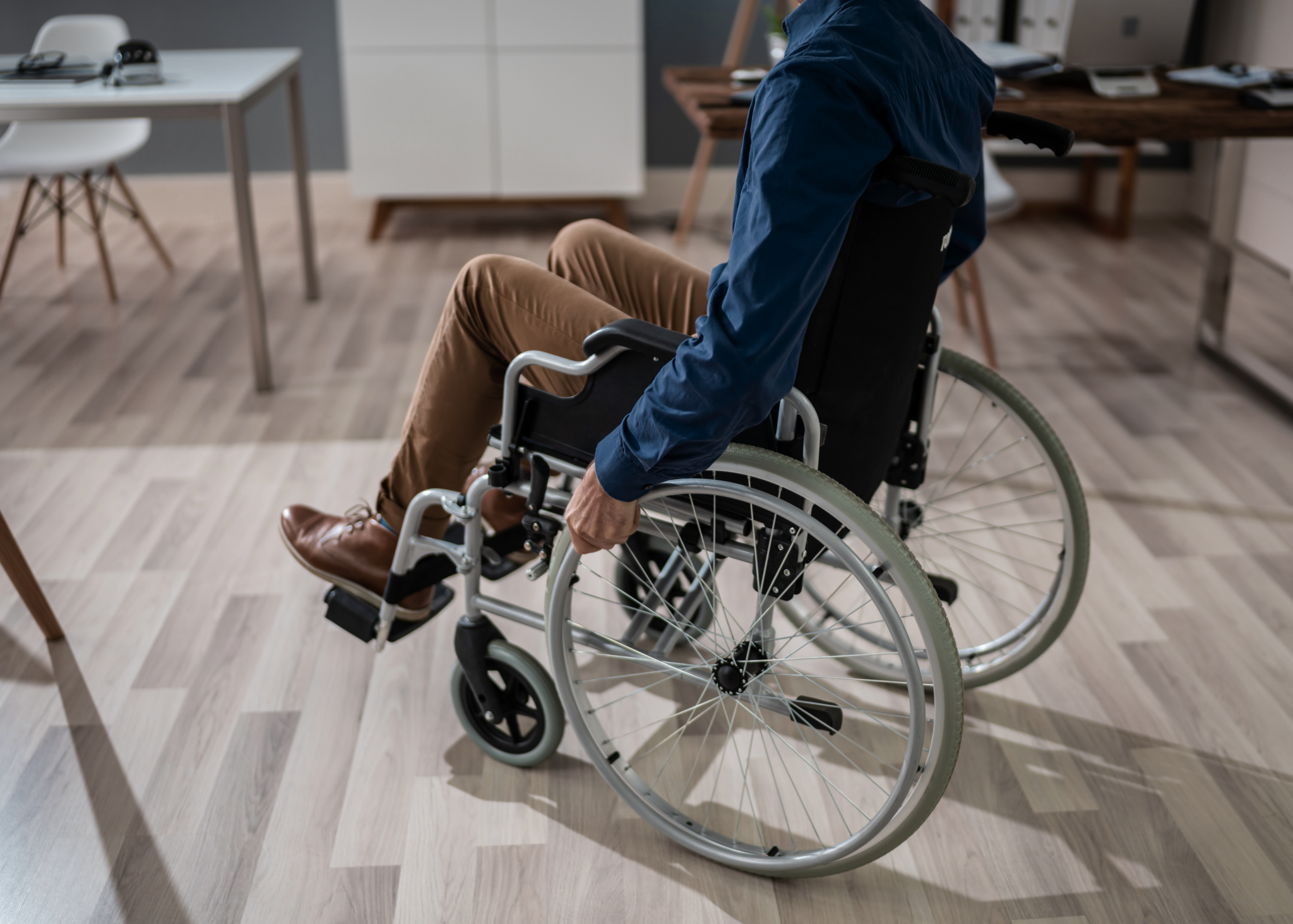 Multiple Sclerosis image of person in wheelchair depicting end stage ms