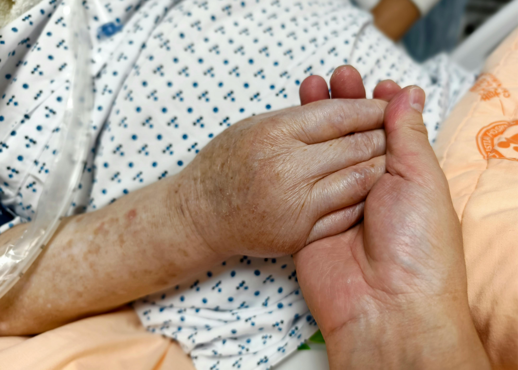 Stroke Care hands holding representing palliative and hospice care for stroke